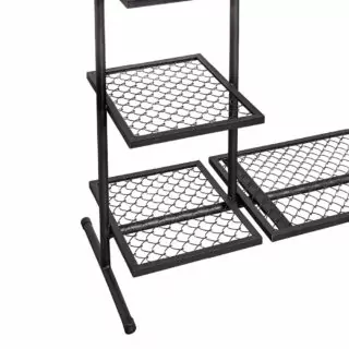 Coat rack 3.1 Mesh made of steel tube and mesh. Features a clothes rail with storage shelves.